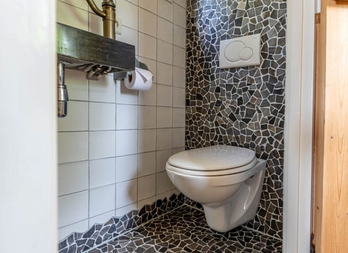 Dining and sitting area in Holiday Home in Wezep/Oldebroek, ideal for a relaxing Veluwe vacation.