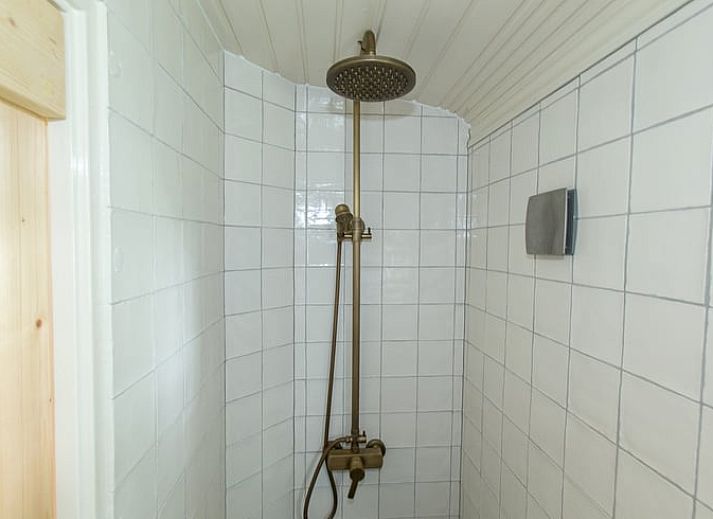 Dining and sitting area in Holiday Home in Wezep/Oldebroek, ideal for a relaxing Veluwe vacation.