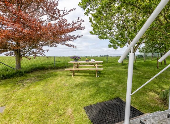 Dining and sitting area in Holiday Home in Wezep/Oldebroek, ideal for a relaxing Veluwe vacation.