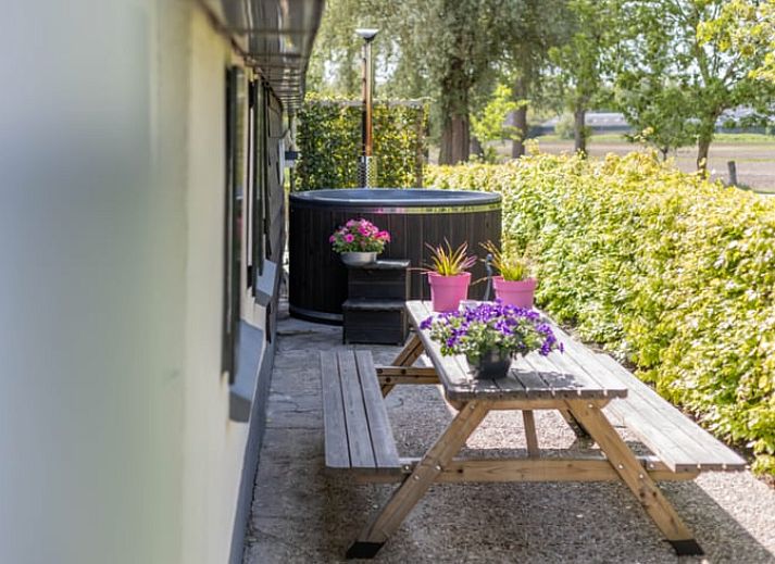 Cozy living room of Holiday home in Wezep Oldebroek, Veluwe, Gelderland with comfortable seating area.