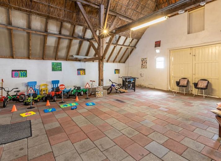 Cozy living room of Holiday home in Wezep Oldebroek, Veluwe, Gelderland with comfortable seating area.