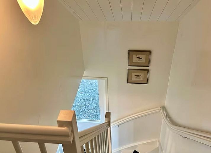 Gemuetlicher Innenbereich des Ferienhauses in Voorthuizen, Veluwe, mit moderner Kueche und gemuetlicher Sitzecke in Gelderland.