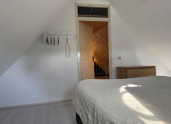 Gemuetlicher Gartensitzplatz im Ferienhaus in Vaassen, Veluwe, umgeben von der Natur.