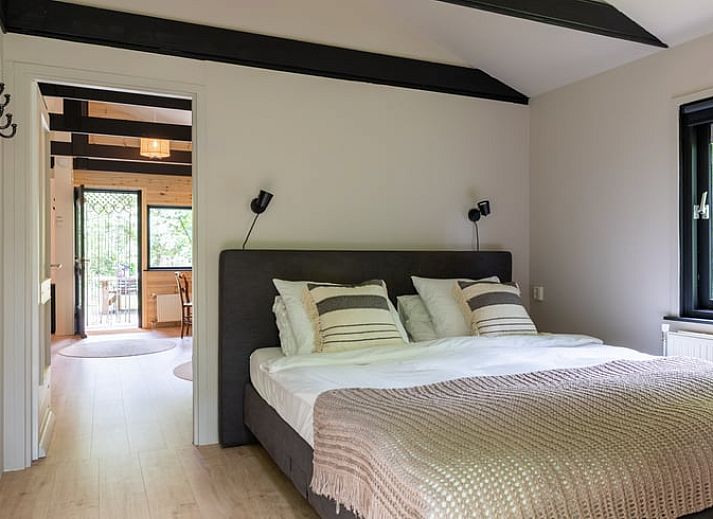 Cozy sitting area on veranda of vacation home in Hulshorst, Veluwe, Gelderland.