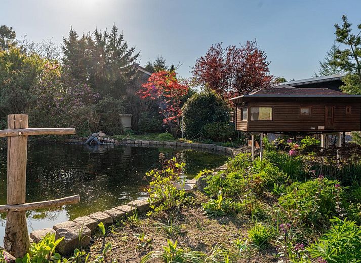 Comfortabele woonkamer in Tiny Koolmees vakantiehuis in Hulshorst, Veluwe.