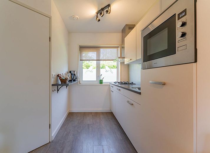 Lichte slaapkamer in Tiny Koolmees vakantiehuis in Hulshorst, Veluwe.