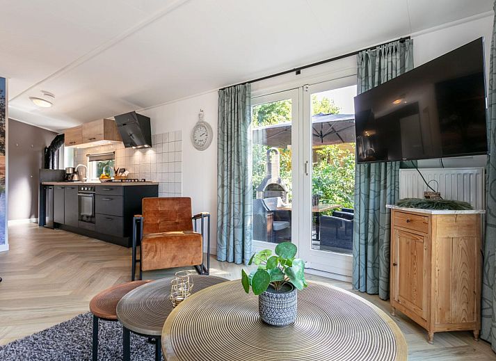 Comfortable sitting area in De Tortelduif chalet, Hulshorst, Veluwe.