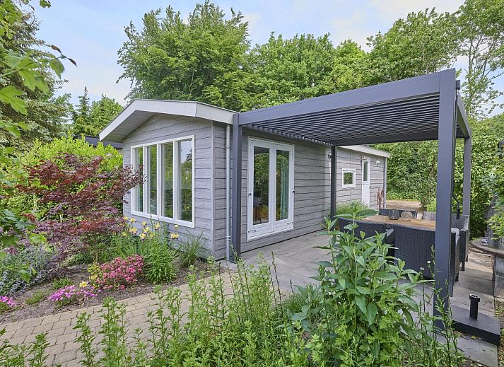 Comfortable sitting area in De Tortelduif chalet, Hulshorst, Veluwe.