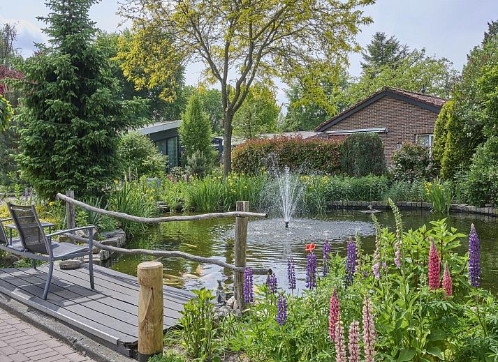 Vakantiehuis Kerkuil in Hulshorst, Veluwe, biedt een prachtig uitzicht op de natuurlijke omgeving.