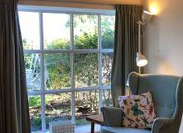 Vakantiehuis in Hulshorst met groene tuin, een oase van rust in de Veluwe, Gelderland.