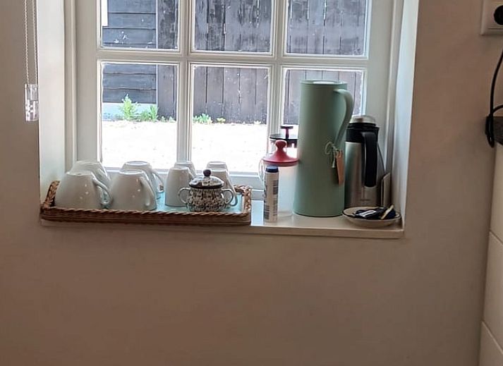 Sfeervol vakantiehuis in Hulshorst met bloesem voorgevel, Veluwe, Gelderland.