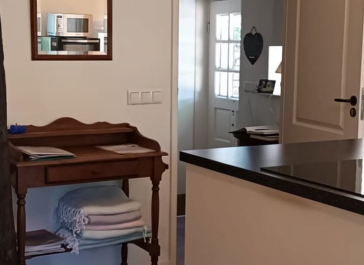 Sfeervol vakantiehuis in Hulshorst met bloesem voorgevel, Veluwe, Gelderland.