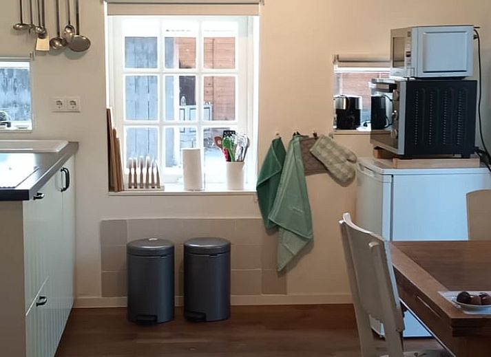 Sfeervol vakantiehuis in Hulshorst met bloesem voorgevel, Veluwe, Gelderland.