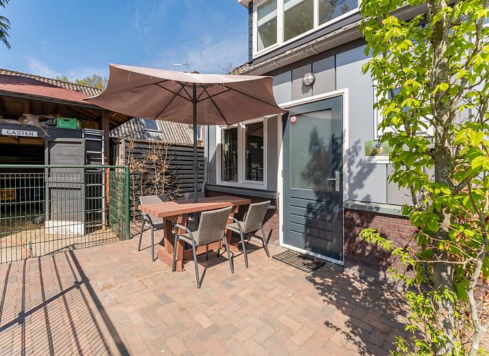 Gemuetliches, modern eingerichtetes Wohnzimmer des Ferienhauses Pimpelmees in Hulshorst, Veluwe, Gelderland.