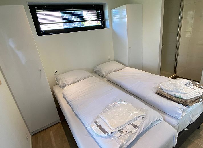 Modernes Einfamilienhaus in Hulshorst, Veluwe, Gelderland, mit groer Terrasse, umgeben von grner Natur.