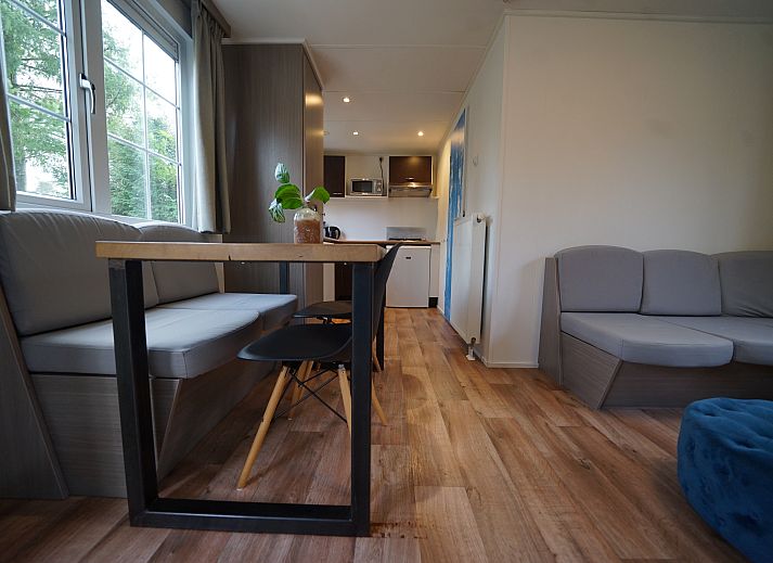 Chalet in Otterlo with terrace in Veluwe, Gelderland, surrounded by nature.