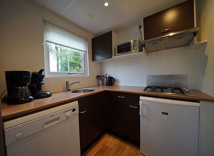 Cozy sitting area in Chalet in Otterlo, Veluwe, ideal for relaxation.
