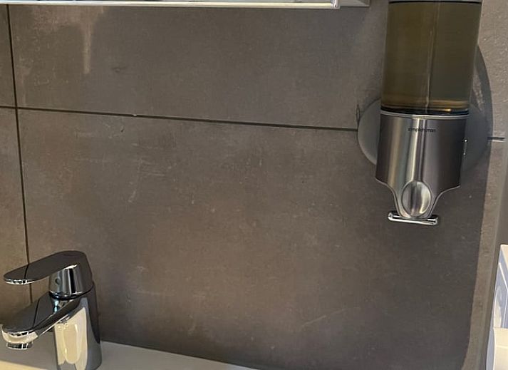 Modern kitchen and sitting area in Cottage in Otterlo, a vacation accommodation in Otterlo, Veluwe, Gelderland.