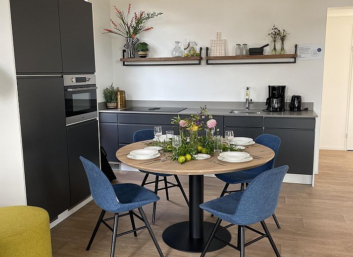 Gezellige woonkamer van Vrijstaande woning in Otterlo, Veluwe, met moderne inrichting en veel natuurlijk licht in Gelderland.
