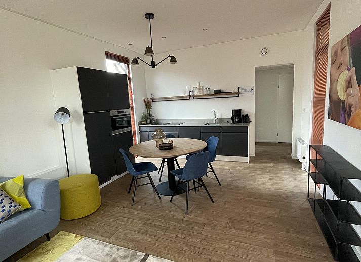 Gezellige woonkamer van Vrijstaande woning in Otterlo, Veluwe, met moderne inrichting en veel natuurlijk licht in Gelderland.