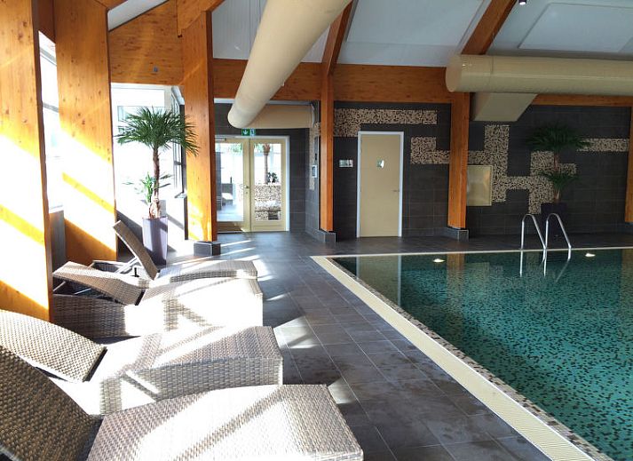 Gezellige zithoek in Vakantiehuis Geheim van Otterlo 6 in Otterlo, Veluwe, Gelderland voor ontspanning.