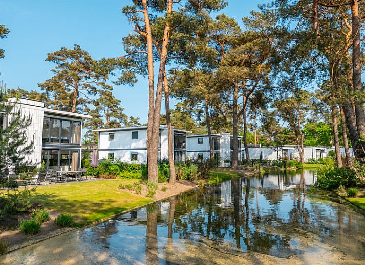 Gezellige zithoek in Vakantiehuis Geheim van Otterlo 6 in Otterlo, Veluwe, Gelderland voor ontspanning.