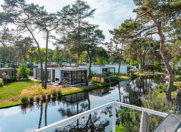 Gezellige zithoek in Vakantiehuis Geheim van Otterlo 6 in Otterlo, Veluwe, Gelderland voor ontspanning.