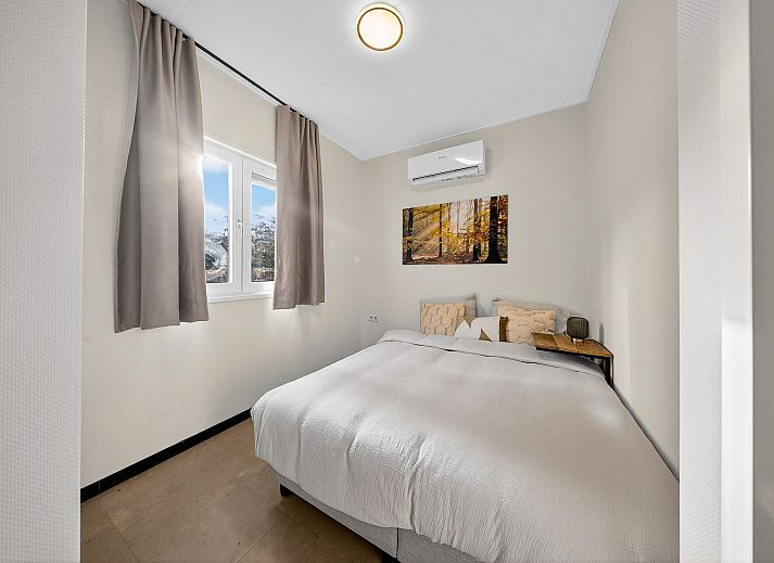 Vrijstaande woning in Otterlo, een modern vakantiehuis in de Veluwe, Gelderland, omringd door natuur en rustieke bossen.