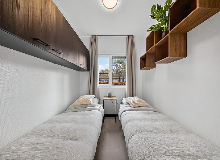 Vrijstaande woning in Otterlo, een modern vakantiehuis in de Veluwe, Gelderland, omringd door natuur en rustieke bossen.