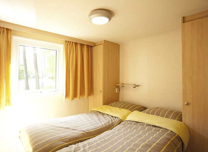 Binnenzwembad bij Vakantiehuis Unique 4 in Otterlo, Veluwe, ideaal voor ontspanning en recreatie.