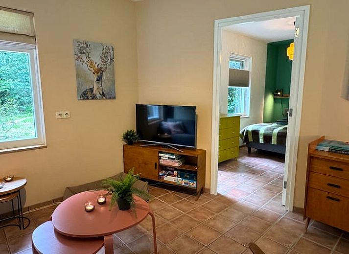 Ontdek de serene bosrijke omgeving van Vakantiehuis in Otterlo, Veluwe, Gelderland, perfect voor natuurliefhebbers en rustzoekers.