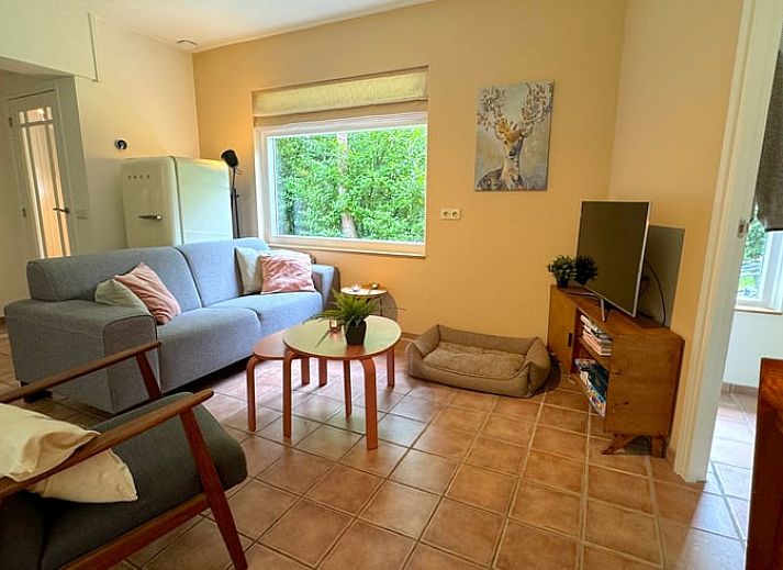 Ontdek de serene bosrijke omgeving van Vakantiehuis in Otterlo, Veluwe, Gelderland, perfect voor natuurliefhebbers en rustzoekers.