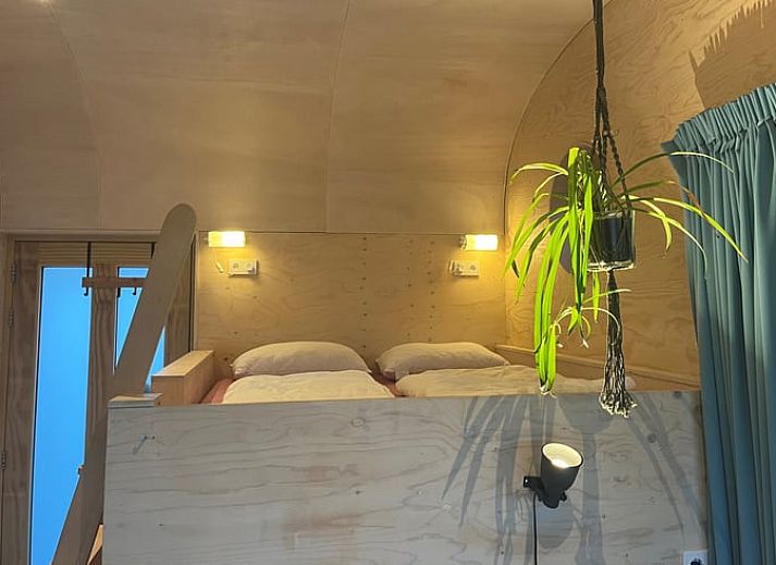 Geniet van de serene veranda bij Vakantiehuis in Otterlo, gelegen in de prachtige Veluwe, Gelderland.