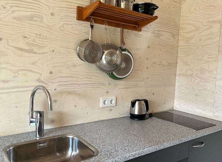 Moderne vakantiehuis in Otterlo met zonnige veranda, gelegen in de Veluwe, Gelderland, omgeven door natuur en rust.