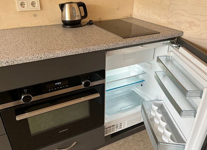 Moderne vakantiehuis in Otterlo met zonnige veranda, gelegen in de Veluwe, Gelderland, omgeven door natuur en rust.