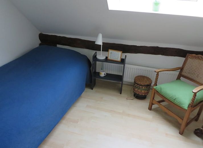 Gezellige woonkamer van Vakantiehuis in Epe, Veluwe, Gelderland, met comfortabele banken en veel natuurlijk licht.