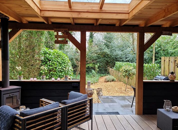 Enjoy the covered porch of Holiday Home in Epe, Veluwe, overlooking the natural surroundings of Gelderland.