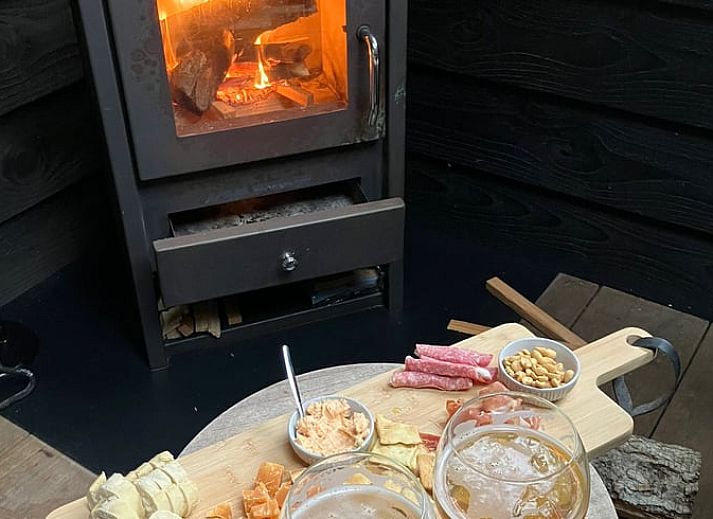 Enjoy the covered porch of Holiday Home in Epe, Veluwe, overlooking the natural surroundings of Gelderland.