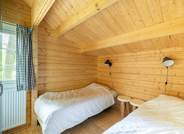 Cozy interior of Veluwe lodge in Epe, Veluwe with wooden interior and modern amenities.