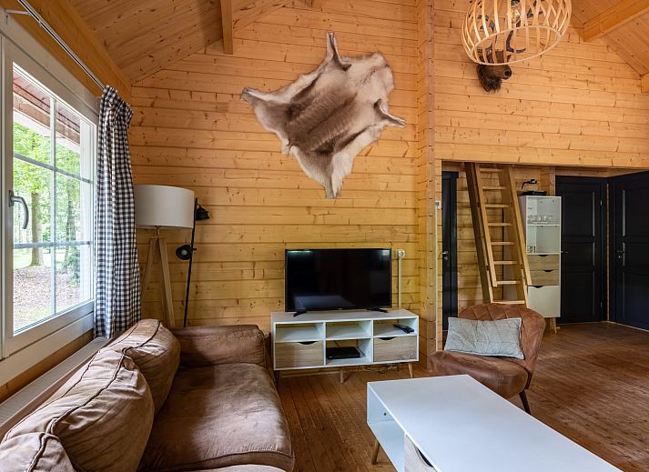 Cozy interior of Veluwe lodge in Epe, Veluwe with wooden interior and modern amenities.