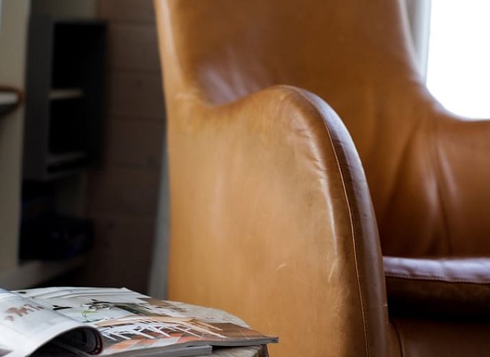 Charmantes Ferienhaus in Epe, Veluwe, Gelderland mit einer einladenden Veranda und gruener Umgebung, ideal fuer einen entspannten Aufenthalt.