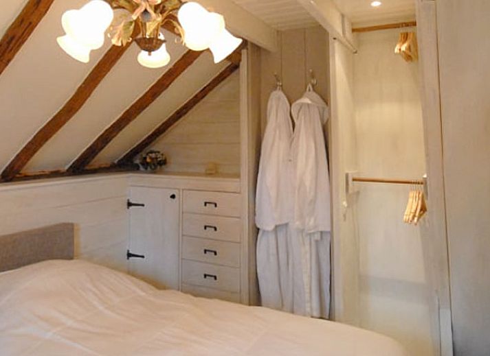 Gemuetliches Ferienhaus in Vierhouten in der Veluwe, umgeben von gruener Natur in Gelderland, ideal fuer einen entspannten Aufenthalt.