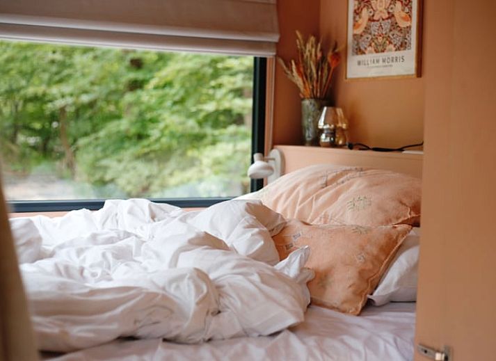 Gezellige veranda bij Huisje in Nunspeet, vakantiehuis op de Veluwe in Gelderland.