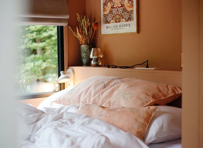 Gezellige veranda bij Huisje in Nunspeet, vakantiehuis op de Veluwe in Gelderland.