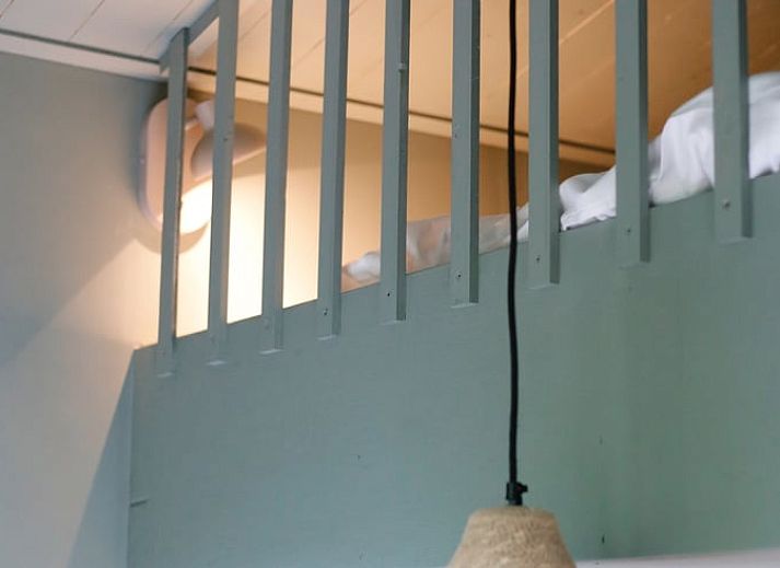 Knusse slaapkamer in Huisje in Nunspeet, vakantiehuis in de Veluwe, Gelderland.