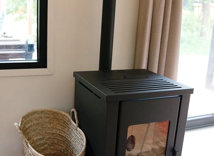 Slaapkamer met uitzicht op de natuur in Huisje in Nunspeet, Veluwe, Gelderland.