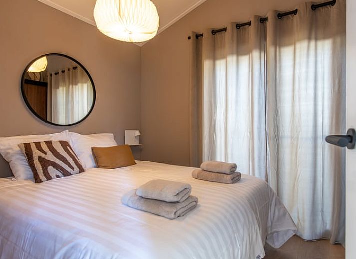 Geniessen Sie die Terrasse des Ferienhauses in Nunspeet, das in Veluwe, Gelderland, inmitten der Natur und Ruhe liegt.