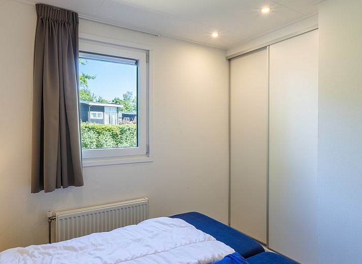 Zonnig terras van Vrijstaande woning in Nunspeet, vakantiehuis op de Veluwe in Gelderland.