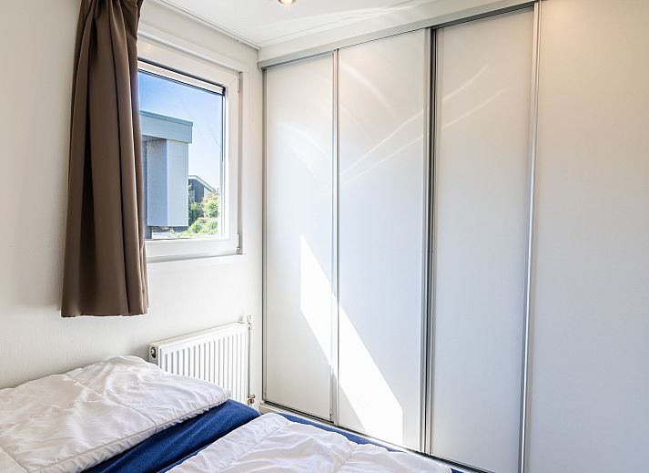 Zonnig terras van Vrijstaande woning in Nunspeet, vakantiehuis op de Veluwe in Gelderland.