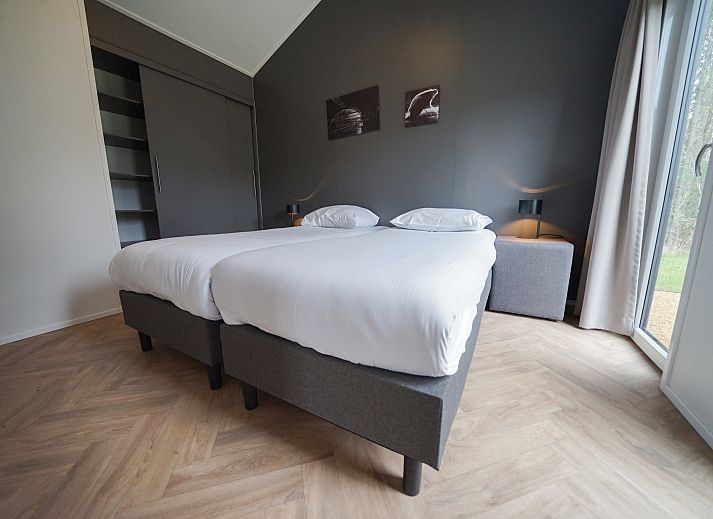 Chalet in Nunspeet met moderne veranda, omringd door Veluwse natuur in Gelderland.